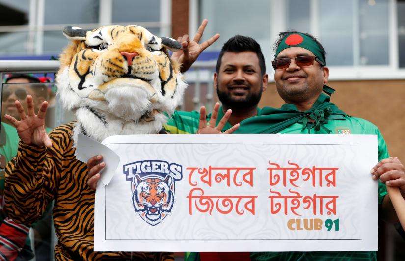 ICC Cricket World Cup - West Indies v Bangladesh - The County Ground, Taunton, Britain - June 17, 2019 Bangladesh fans hold up a banner during the match. Action Images via Reuters