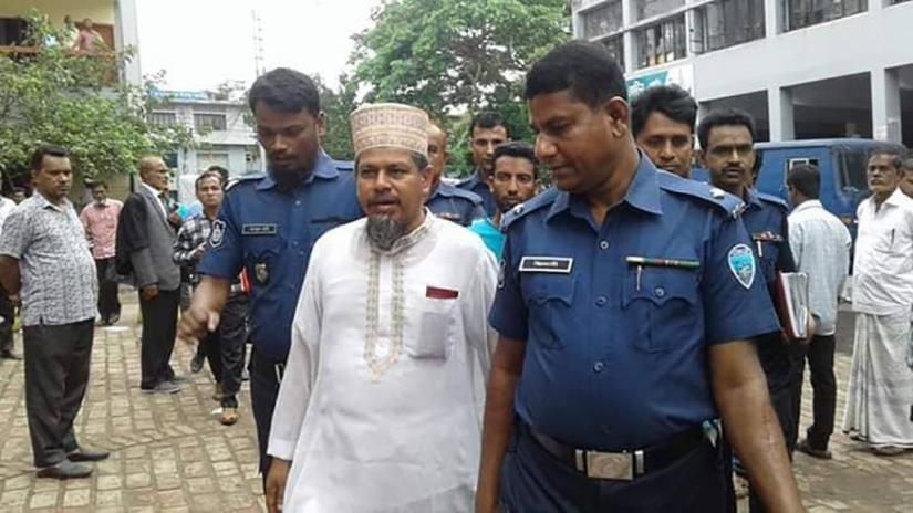 Feni`s Sonagazi Madrasa Principal and main accused in the arson attack case of a student from the same madrasa Siraj-ud-Daula, being taken to remand by police in Feni, April 10, 2019 Dhaka Tribune