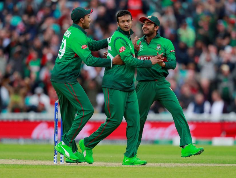 ICC Cricket World Cup - Bangladesh v New Zealand - The Oval, London, Britain - June 5, 2019 Bangladesh `s Shakib Al Hasan celebrates with team mates after taking the wicket of New Zealand`s Martin Guptill Action Images via Reuters