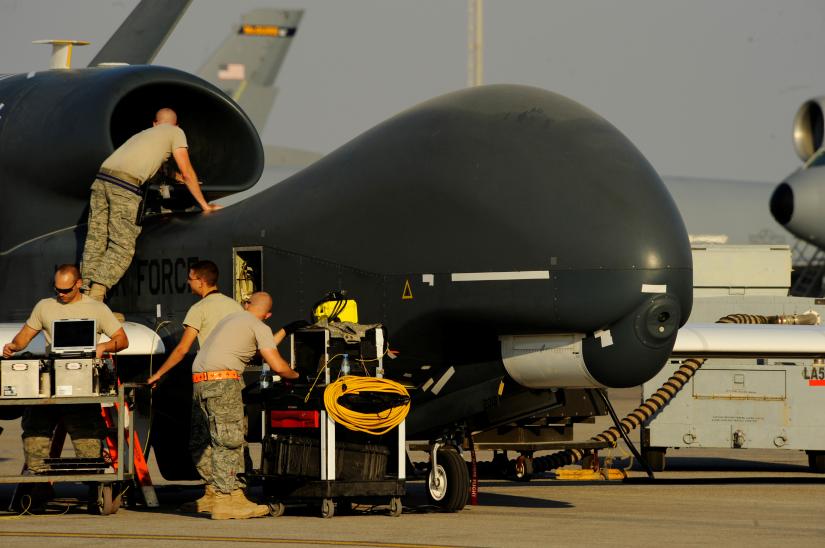 U.S. Air Force maintainers prepare a U.S. military drone RQ-4A Global Hawk for takeoff at an undisclosed location in Southwest Asia, December 2, 2010. Picture taken December 2, 2010. Courtesy Eric Harris/U.S. Air Force/Handout via REUTERS