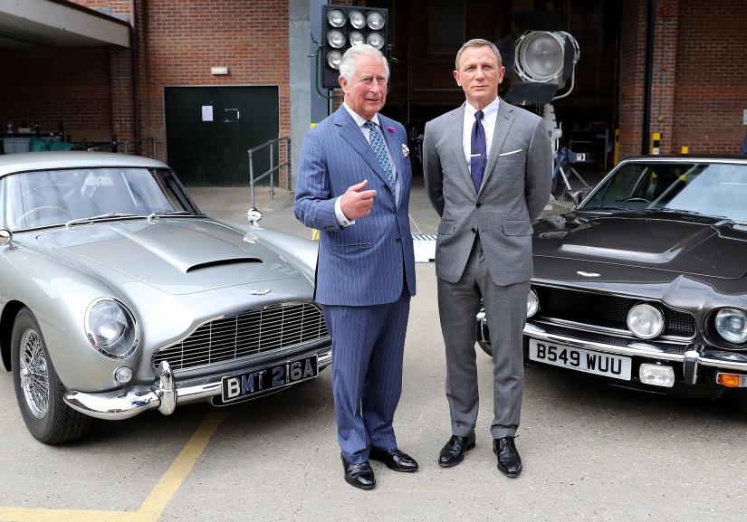 Britain`s Prince Charles meets with actor Daniel Craig as he tours the set of the 25th James Bond Film at Pinewood Studios in Iver Heath, Buckinghamshire, Britain June 20, 2019.Pool via REUTERS