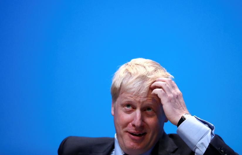 Boris Johnson, a leadership candidate for Britain`s Conservative Party, gestures during a hustings event in Birmingham, Britain, June 22, 2019. REUTERS