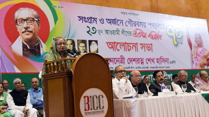 Prime Minister and Awami League President Sheikh Hasina addresses  a discussion organized by her party at Bangabandhu International Conference Centre in Dhaka on Monday (Jun 24) on the occasion of its 70th founding anniversary. PID