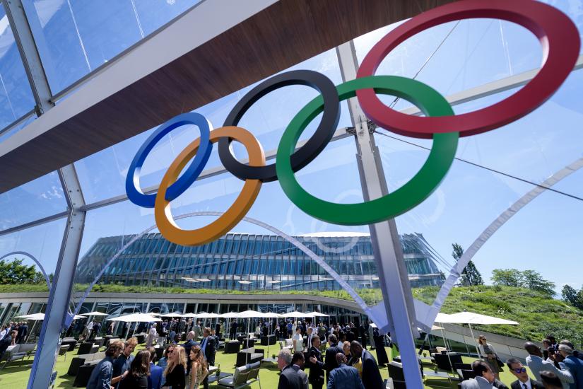 Guest are seen in front of the Olympic House, the new International Olympic Committee (IOC) headquarters, after the inauguration ceremony in Lausanne, Switzlerland June 23, 2019 ahead of the decision on 2026 Winter Games host.Pool via REUTERS