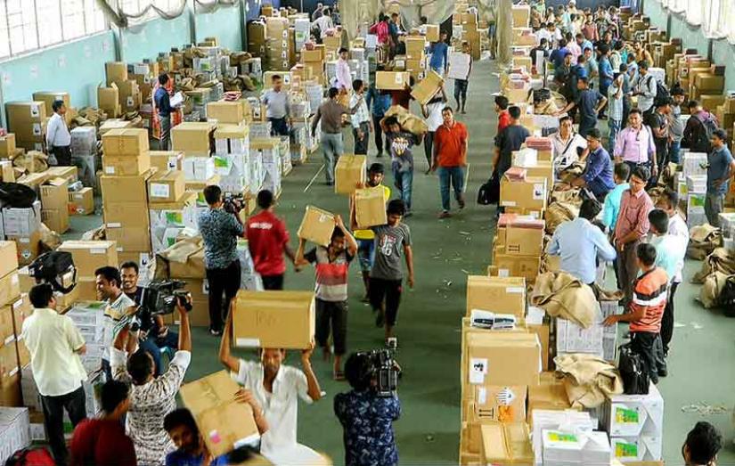 Electronic Voting Machines (EVMs) are being sent to polling centers from Shaheed Chandu Stadium in Bogura on Sunday, June 23, 2019