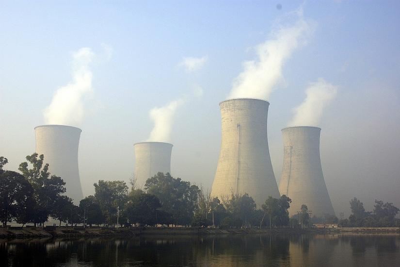 Emissions from a coal power plant in Punjab, India. WIKIMEDIA COMMONS