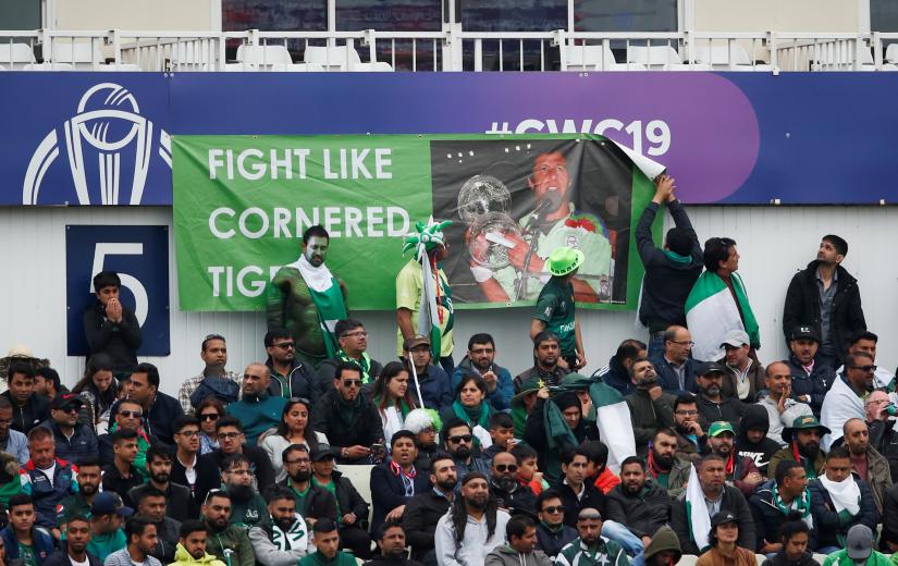 ICC Cricket World Cup - New Zealand v Pakistan - Edgbaston, Birmingham, Britian - June 26, 2019 Pakistan fans display a banner in reference to Pakistan`s Prime Minister Imran Khan during the match Action Images via Reuters