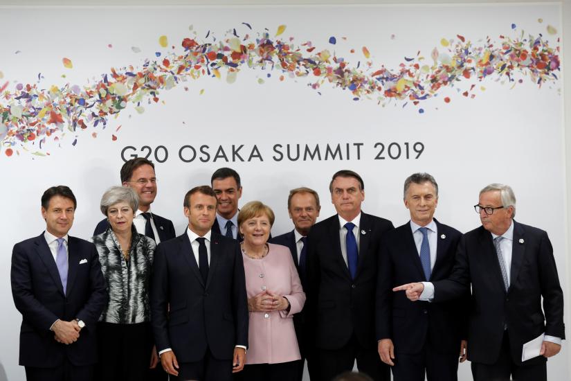 Leaders pose for a picture during the G20 summit in Osaka, Japan, June 29, 2019. REUTERS