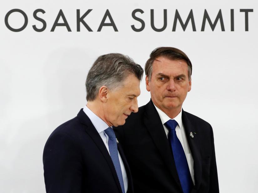 Argentina`s President Mauricio Macri and Brazil`s President Jair Bolsonaro during a news conference at the G20 summit in Osaka, Japan, June 29, 2019. REUTERS