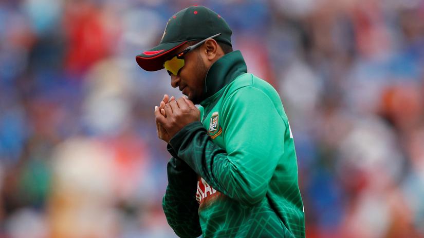FILE PHOTO: Bangladesh`s Shakib Al Hasan takes the catch to dismiss India`s MS Dhoni - ICC Cricket World Cup - Bangladesh v India - Edgbaston, Birmingham, Britain - July 2, 2019. Reuters