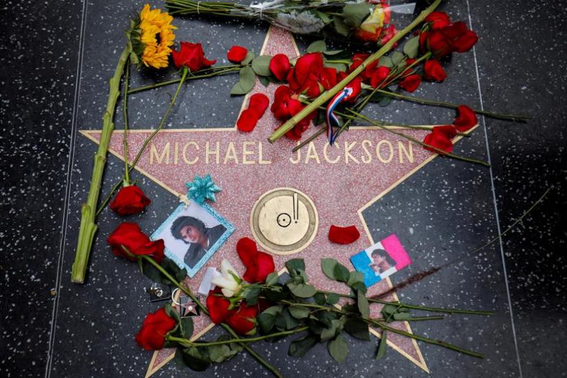 Flowers surround Michael Jackson`s star on the Hollywood Walk of Fame ten years after the death of child star turned King of Pop in Los Angeles, California, US, June 25, 2019. REUTERS/File Photo