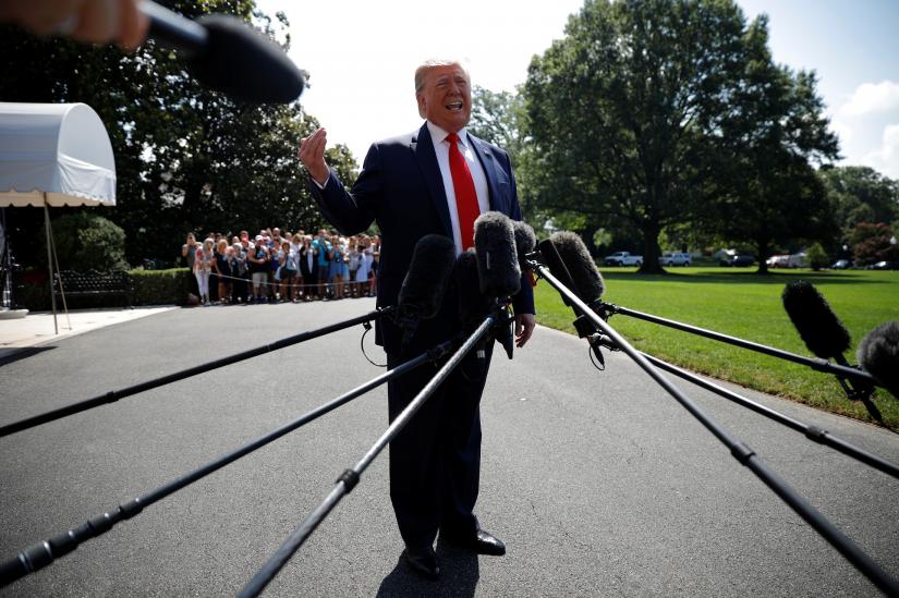 U.S. President Donald Trump talks to reporters as he departs for travel to New Jersey from the South Lawn of the White House in Washington, U.S., July 5, 2019. REUTERS