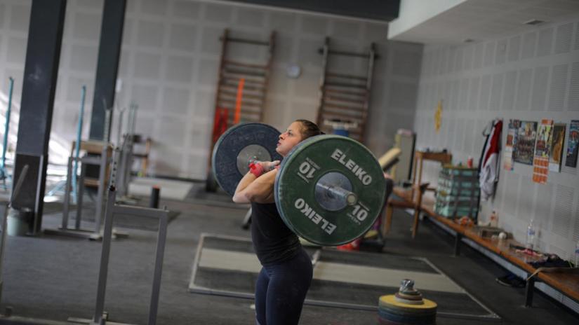 An athlete of Bulgaria`s national weightlifting team takes part in practice session in Sofia, Bulgaria, Oct 16, 2018. REUTERS/File Photo