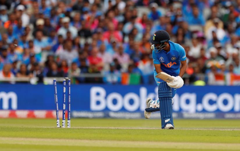Cricket - ICC Cricket World Cup Semi Final - India v New Zealand - Old Trafford, Manchester, Britain - July 10, 2019 India`s Bhuvneshwar Kumar loses his wicket Action Images via Reuters