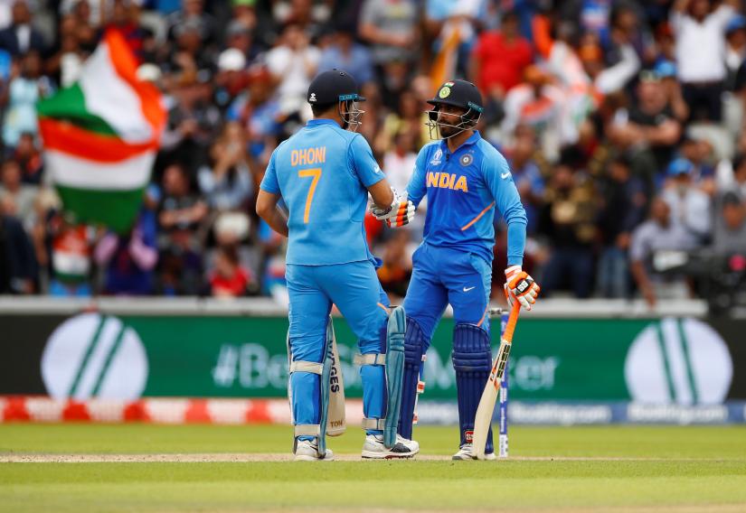 Cricket - ICC Cricket World Cup Semi Final - India v New Zealand - Old Trafford, Manchester, Britain - July 10, 2019 India`s Dinesh Karthik reacts after losing his wicket Action Images via Reuters