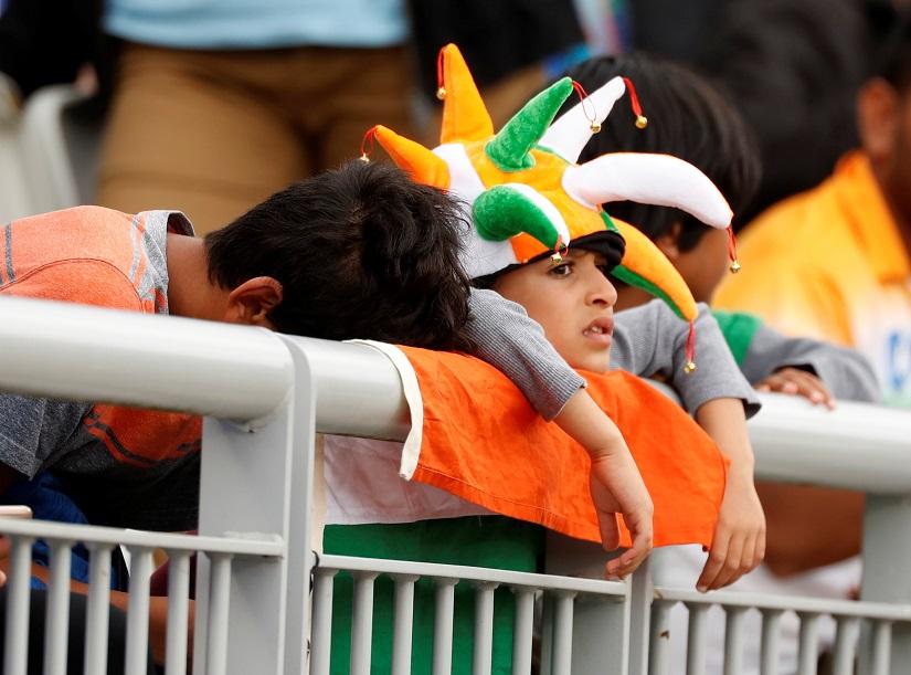 Cricket - ICC Cricket World Cup Semi Final - India v New Zealand - Old Trafford, Manchester, Britain - July 10, 2019 India fans react Action Images via Reuters