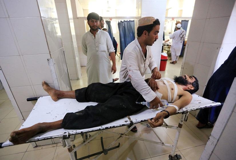 An injured man receives treatment at the hospital, after a suicide attack in Jalalabad, Afghanistan July 12, 2019. REUTERS