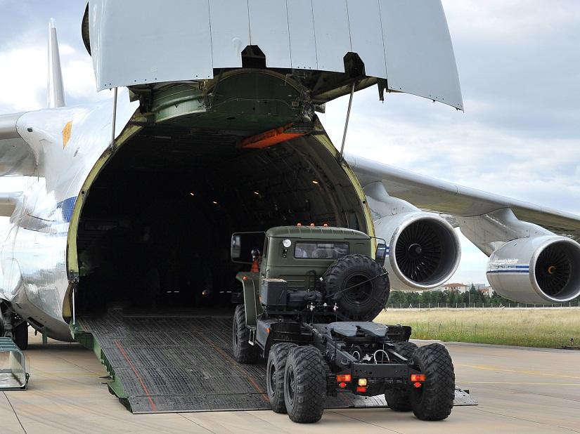 First parts of a Russian S-400 missile defense system are unloaded from a Russian plane at Murted Airport, known as Akinci Air Base, near Ankara, Turkey, July 12, 2019. Turkish Military/Turkish Defence Ministry/Handout via REUTERS