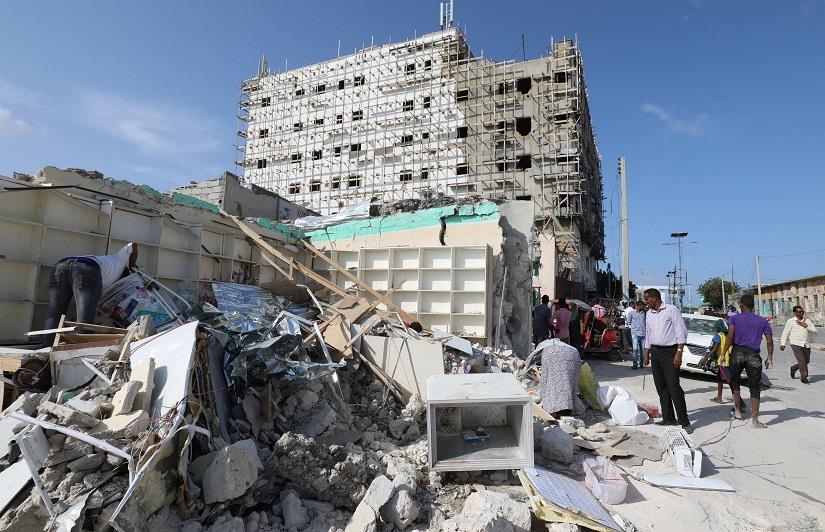 A general view shows people at the scene of a suicide car explosion at a check point near Somali Parliament building in Mogadishu, Somalia June 15, 2019 REUTERS/File Photo