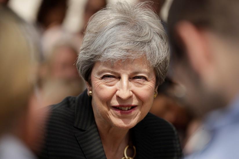 Britain`s Prime Minister Theresa May meets military service personnel and their families at headquarters of Joint Forces Command in Northwood, London, Britain July 8, 2019. REUTERS/File Photo