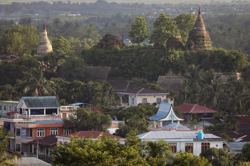 A landscape view of the downtown with ancient pagodas in the background in Mrauk U, Rakhine state, Myanmar June 28, 2019. Picture taken June 28, 2019. REUTERS