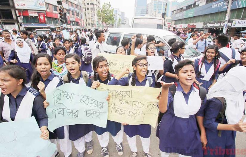 This August 2016 photo shows students of the capital’s Willes Little Flower School and College demonstrating after one of their fellow was stabbed by stalker on her way home from the school. COURTESY