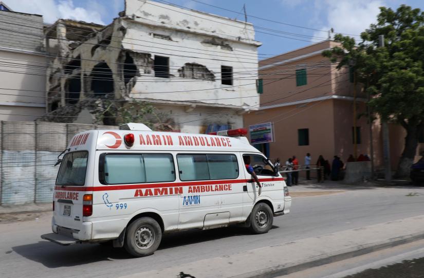 An Aamin ambulance arrives at the scene of a suicide car explosion at a checkpoint near the Somali Parliament building in Mogadishu, Somalia June 15, 2019 REUTERS