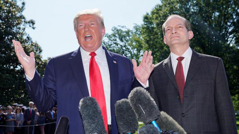 US President Donald Trump announces the resignation of Labor Secretary Alex Acosta (R) before departing for travel to Milwaukee, Wisconsin from the South Lawn of the White House in Washington, US, July 12, 2019. REUTERS