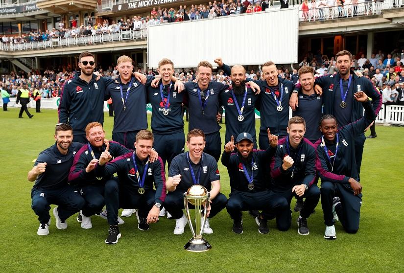 England`s Eoin Morgan poses with team mates and the trophy during the celebrations - ICC Cricket World Cup - England celebrate winning the Cricket World Cup - The Oval, London, Britain - July 15, 2019. Reuters