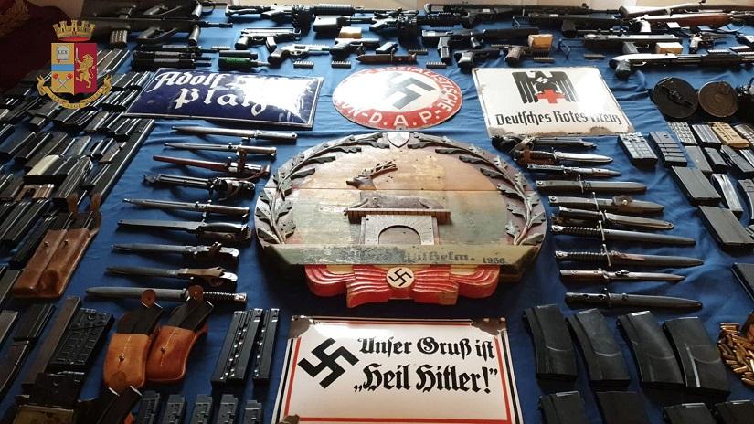 Italian Police handout shows a large arsenal of weapons, including an air-to-air missile, that they say they seized in raids on neo-Nazi sympathisers, in Turin, Italy July 15, 2019. Polizia di Stato/Handout via REUTERS