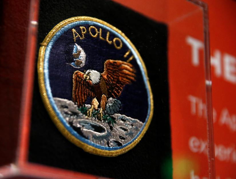 An Apollo 11 mission patch is seen on the anniversary of the Apollo 11 mission launch at the `Destination Moon: The Apollo 11 Mission` exhibit at the Museum of Flight in Seattle, Washington, U.S., July 16, 2019. REUTERS