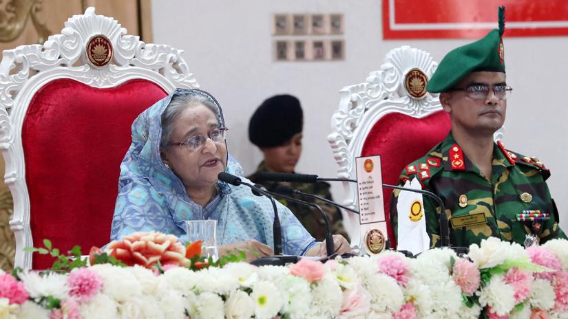 Prime Minister Sheikh Hasina speaking at the 44th founding anniversary of army’s elite President Guard Regiment (PGR) program on Wednesday (Jul 17) at the PGR headquarters at Dhaka Cantonment. PHOTO: Focus Bangla
