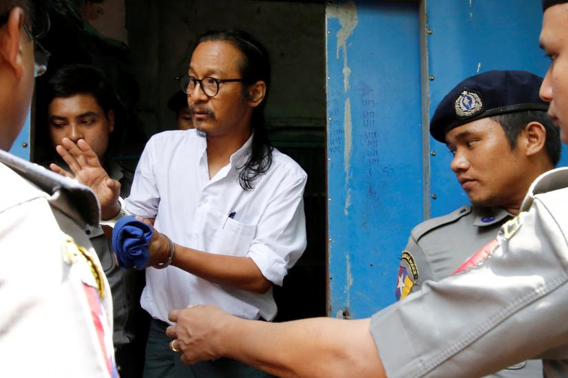 Filmmaker Min Htin Ko Ko Gyi arrives at Insein court before his trial in Yangon, Myanmar May 23, 2019. REUTERS