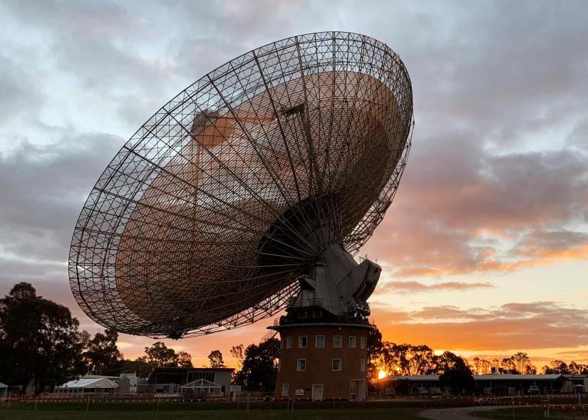 The radio telescope at the Parkes Observatory is pictured at sunset near the town of Parkes, Australia July 15, 2019. REUTERS