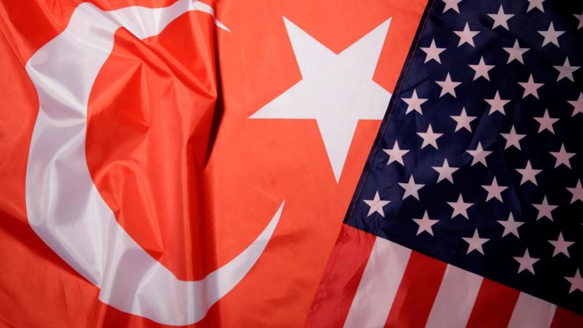 Turkey and US flags are seen in this picture illustration taken Aug 25, 2018. REUTERS/Illustration