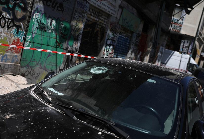 A car with a damaged windshield is seen on a street following an earthquake in Athens, Greece, July 19, 2019. REUTERS