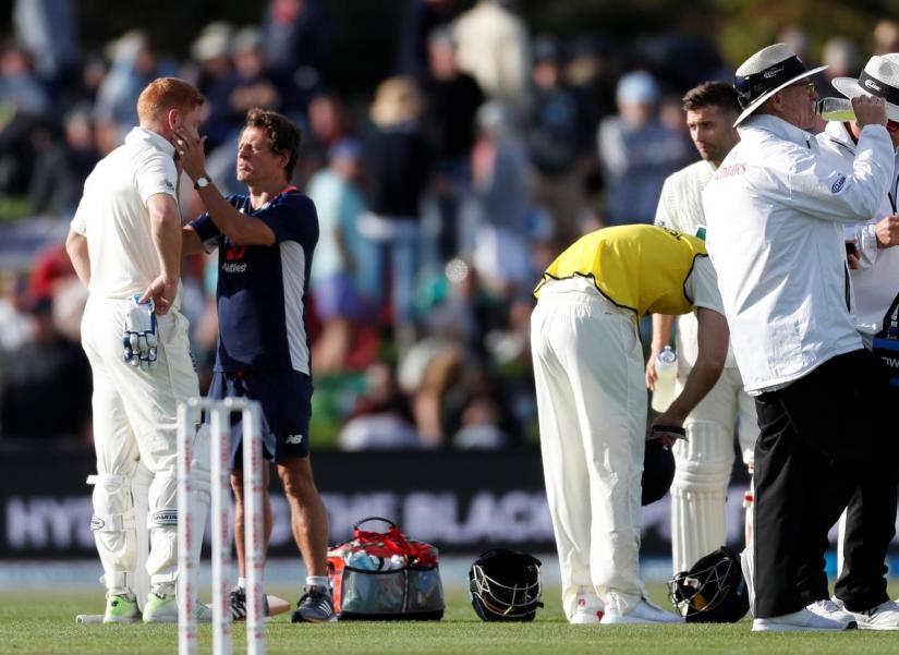 England`s Jonny Bairstow talks with the team doctor after he is struck on the helmet by a ball from New Zealand`s Colin de Grandhomme - Second Test - Hagley Oval, Christchurch, New Zealand - Mar 30, 2018. REUTERS/File Photo