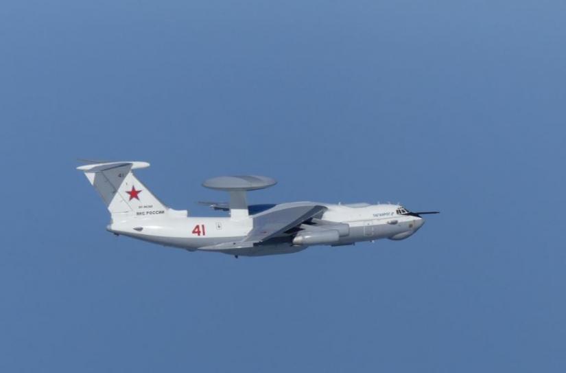 A Russian A-50 military aircraft flies over East China Sea in this handout picture taken by Japan Air Self-Defence Force and released by the Joint Staff Office of the Defense Ministry of Japan July 23, 2019. Joint Staff Office of the Defense Ministry of Japan/HANDOUT via REUTERS