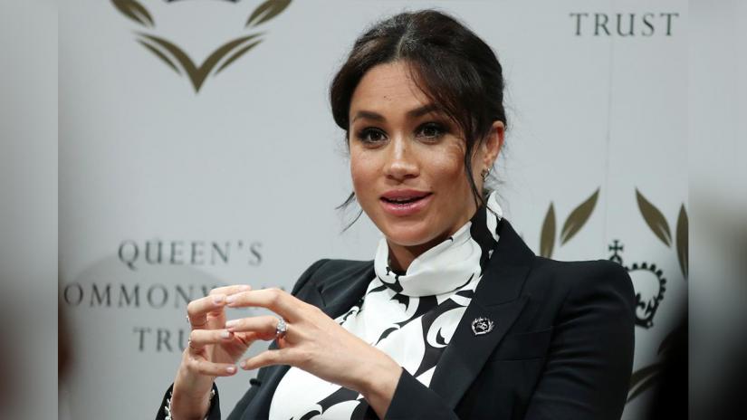 Britain`s Meghan, Duchess of Sussex attends a panel discussion at King`s College London, in London, Britain Mar 8, 2019. Daniel Leal-Olivas/PoolÊvia REUTERS/FILE PHOTO