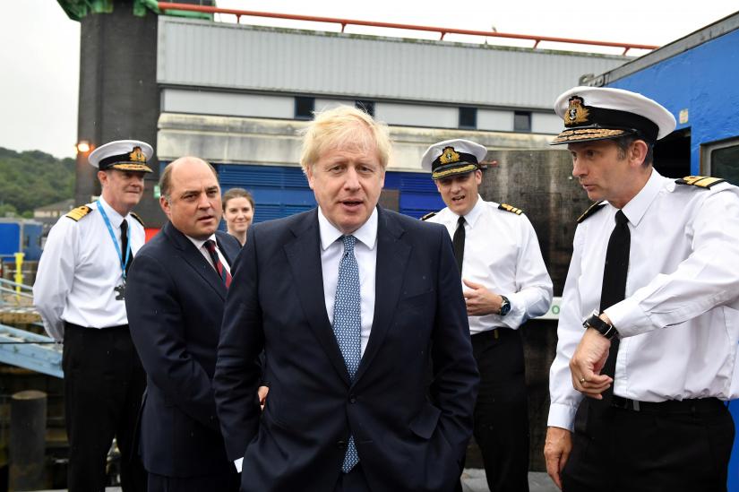 Britain`s Prime Minister Boris Johnson visits HMS Victorious with Defence Secretary Ben Wallace at HM Naval Base Clyde in Faslane, Scotland, Britain July 29, 2019. REUTERS