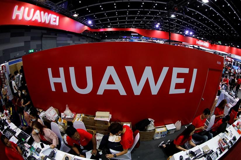 Workers sit at the Huawei stand at the Mobile Expo in Bangkok, Thailand May 31, 2019. REUTERS/File Photo