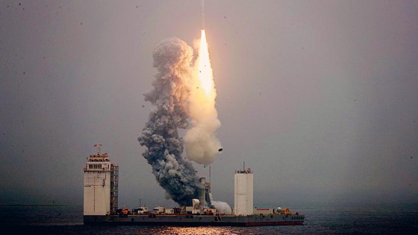 China rockets ahead in space race with first satellite launch from floating sea platform