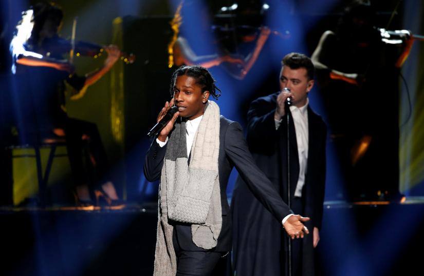 FILE PHOTO: A$AP Rocky performs `I`m Not the Only One` with Sam Smith (R) during the 42nd American Music Awards in Los Angeles, California November 23, 2014. REUTERS