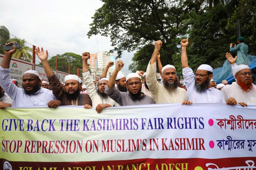Bangladeshi Muslim activists join in a protest against violence against Muslims in Kashmir, in Dhaka, Bangladesh, August 6, 2019. REUTERS
