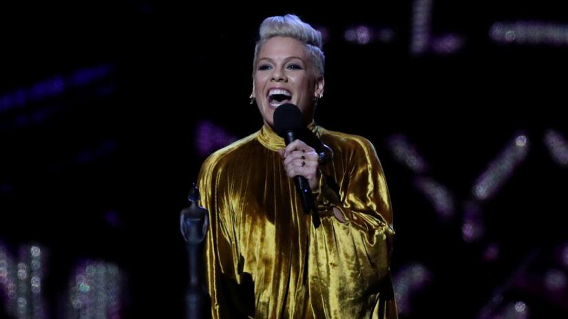FILE PHOTO: Pink with the award for Outstanding Contribution at the Brit Awards at the O2 Arena in London, Britain, Feb 20, 2019. REUTERS