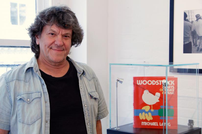 Woodstock producer Michael Lang poses during a photo exhibit that celebrates the 50th anniversary of Woodstock in New York, U.S., August 9, 2019. REUTERS