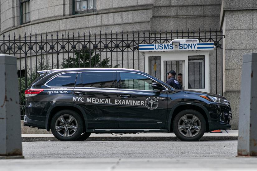 A medical examiner vehicle is seen Metropolitan Correctional Center jail where financier Jeffrey Epstein, who was found dead in the Manhattan borough of New York City, New York, U.S., August 10, 2019. REUTERS