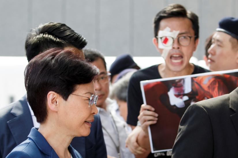 Hong Kong`s Chief Executive Carrie Lam meets petitioners outside her office in Hong Kong, China August 13, 2019. REUTERS