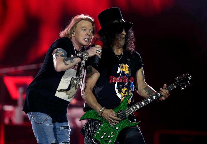 Axl Rose and Slash, lead singer and lead guitarist of U.S. rock band Guns N' Roses, perform during their 'Not in This Lifetime... Tour' at the du Arena in Abu Dhabi, United Arab Emirates November 25, 2018. REUTERS/FILE PHOTO