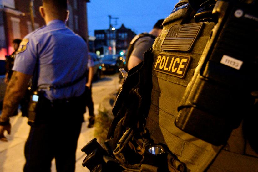Police are seen during an active shooter situation, where Philadelphia police officers were shot during a drug raid on a home, in Philadelphia, Pennsylvania, U.S. August 14, 2019. REUTERS